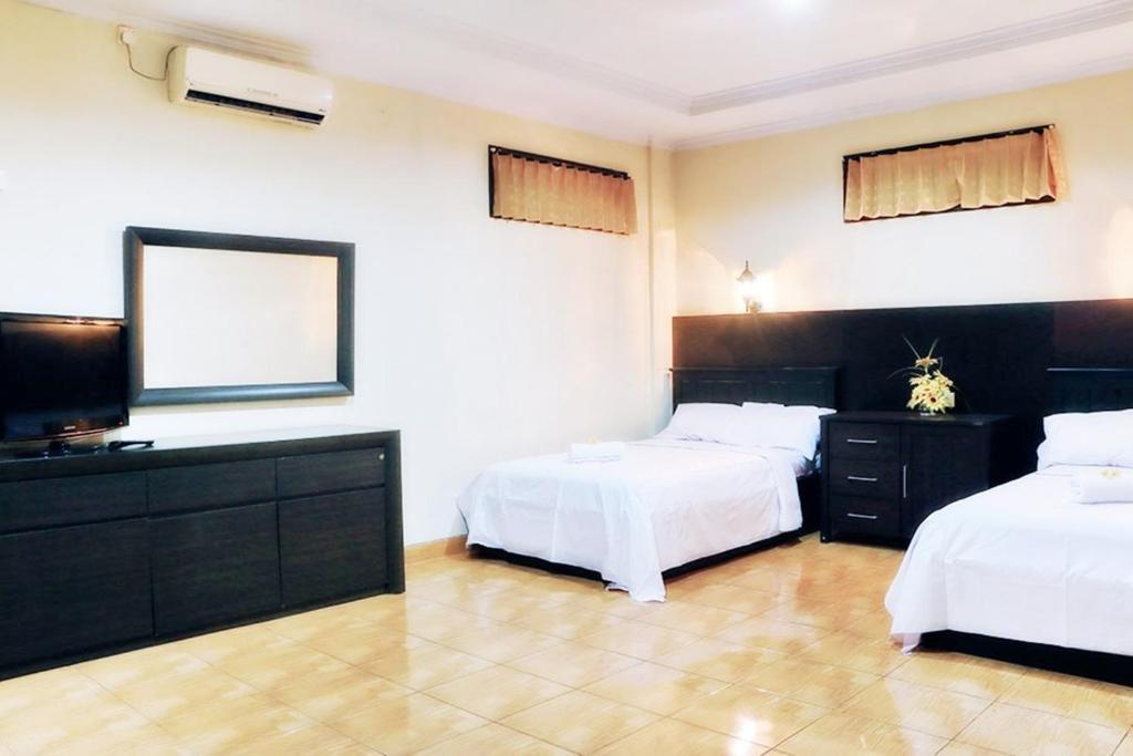Agus Beach Inn Kuta  Bilik gambar